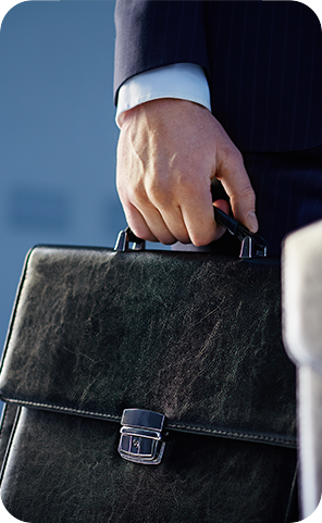 Solicitor carrying a leather briefcase