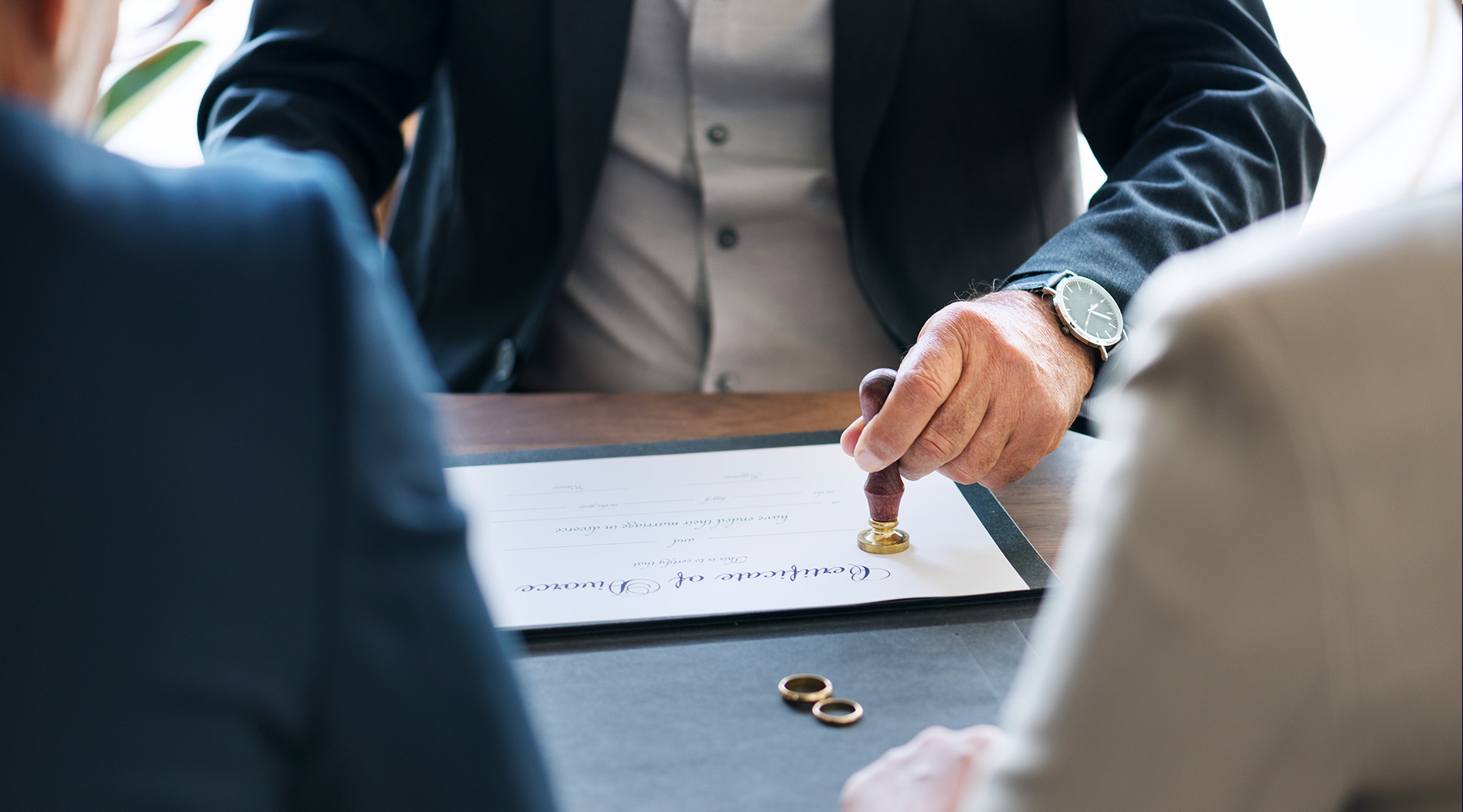 Solicitor stamping a legal certificate